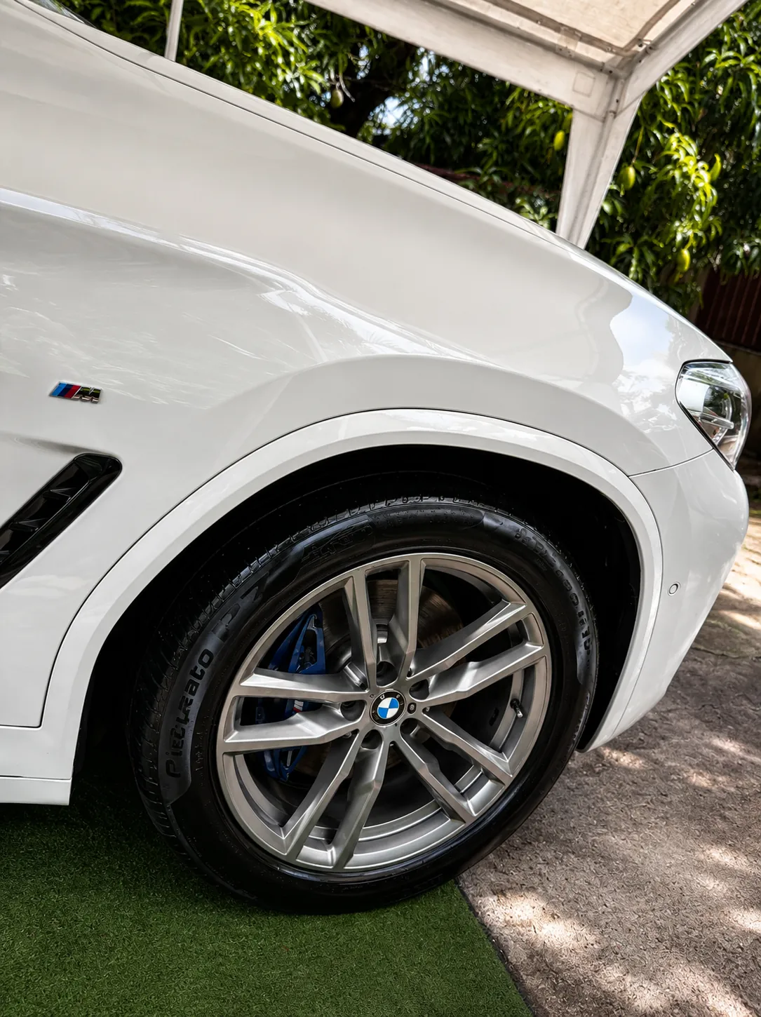 White BMW M wheel and bodywork detail